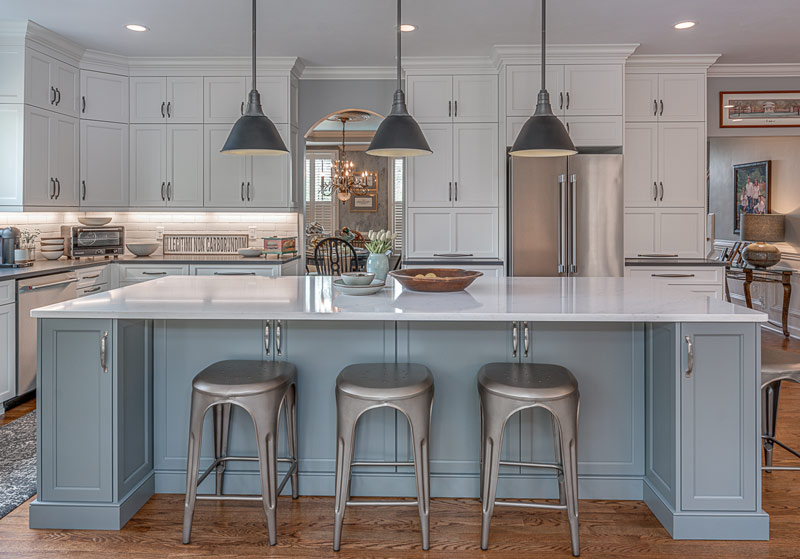 roanoke kitchen cabinet design center featuring blue gray kitchen island with white wall cabinets
