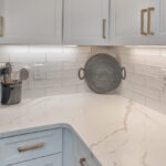 becky ross yonts kitchen design white marble countertop with white cabinetry