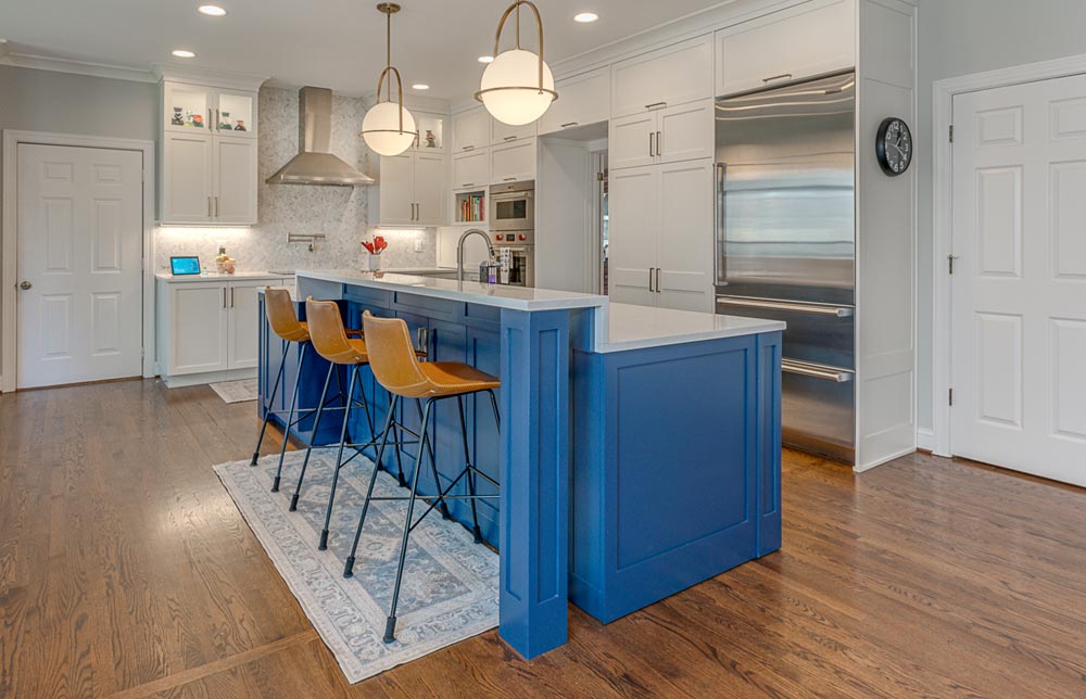 greg papenfus stewart kitchen design featuring blue base cabinet kitchen island and bar stools