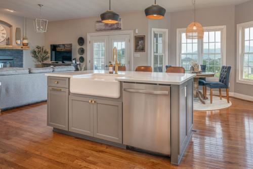 becky ross yonts kitchen design blue kitchen island cabinets with stainless steel appliances and white sink