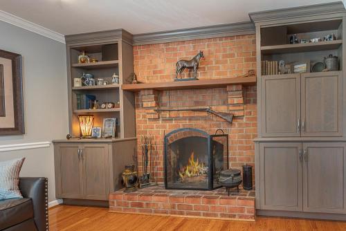 ideal cabinets greg papenfus design downing tv wall and fireplace