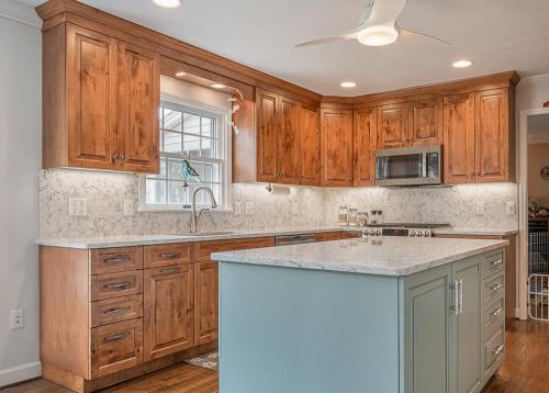ideal cabinets greg papenfus overstreet overview with blue gray kitchen island