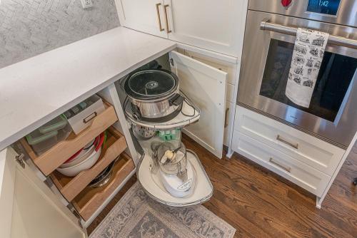 greg papenfus stewart kitchen design slide out shelf base cabinet