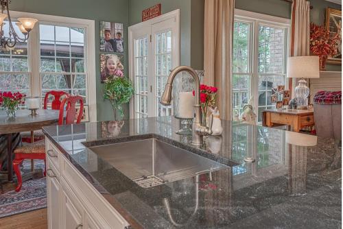 kitchen design by greg vaughan of ideal cabinets in roanoke virginia with kitchen faucet fixture