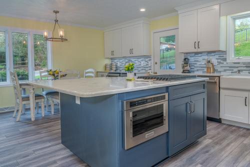 julia fitch beckner kitchen design blue kitchen island white cabinets
