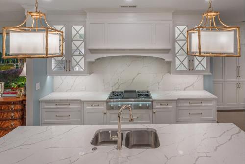 ideal cabinets lara lee kitchen design  island and back wall view