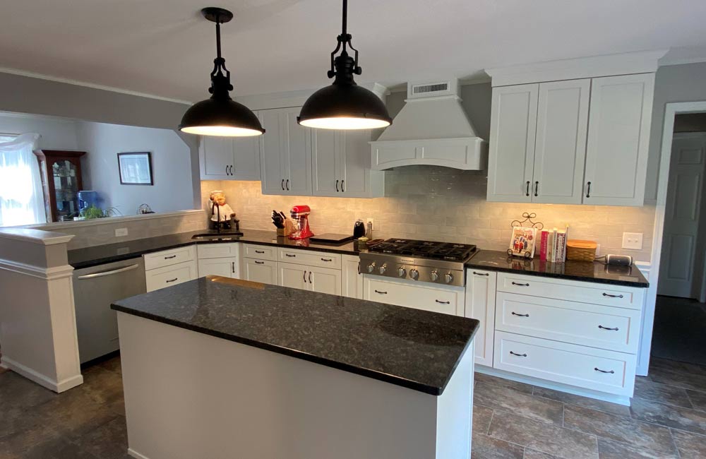 ideal cabinets adriana stevers design spence kitchen island black countertops white cabinets