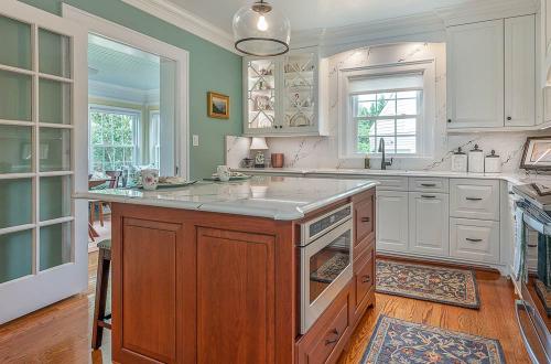 ideal cabinets becky ross kitchen design wood cabinet island with built-in appliance