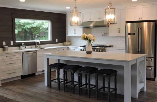 ideal cabinets lara lee strickler kitchen design blw white island brown window wall