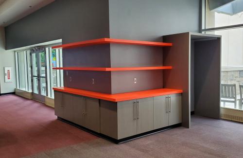 ideal cabinets dean saltus commercial design orange open shelving gray cabinetry