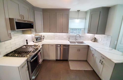 ideal cabinets dean saltus residential kitchen design white cabinets stainless appliances