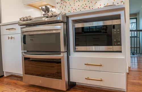 ideal cabinets becky ross kitchen design white cabinetry and stainless appliances