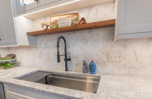ideal cabinets lara lee strickler kitchen design hinton sink with open shelf