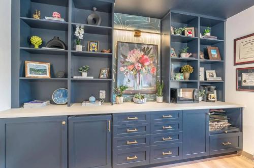 ideal cabinets julia fitch commercial cabinetry design orthodontics office blue wall cabinetry and shelves
