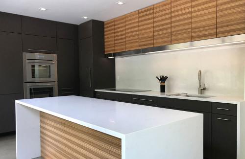 ideal cabinets lara lee strickler modern pearman kitchen design white kitchen island dark wall cabinetry 