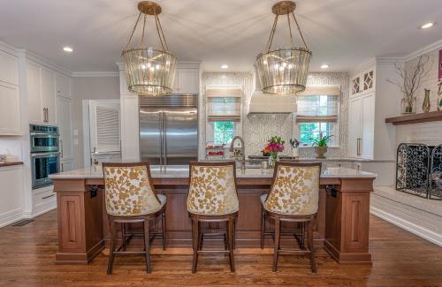 ideal cabinets lara lee strickler  turner kitchen design island with gold pendant lights