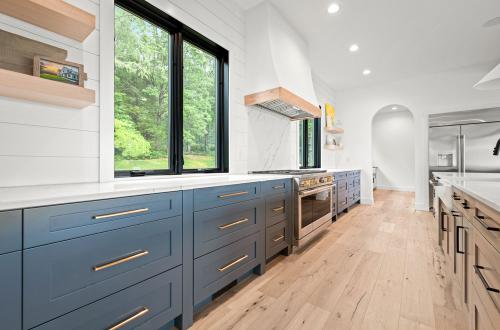 ideal cabinets victoria bombardieri kitchen design blue base cabinets floating wood shelves