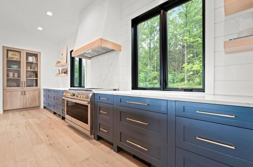 ideal cabinets victoria bombardieri kitchen design blue cabinets with white and wood accent
